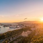 Skats uz Malagu no Gibralfaro pils saulrietā
